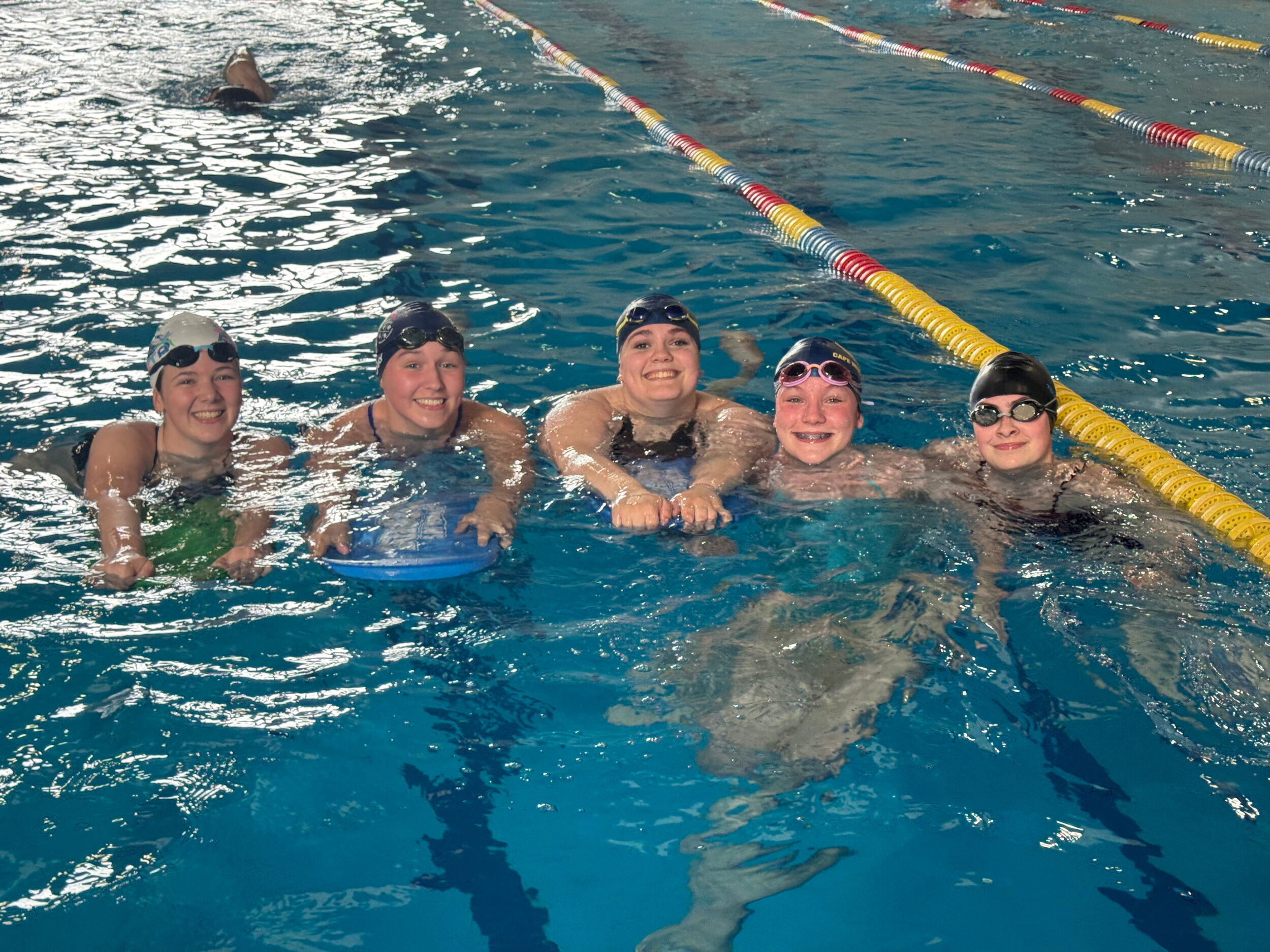 Cape Breton Dorados swimmers together in the pool