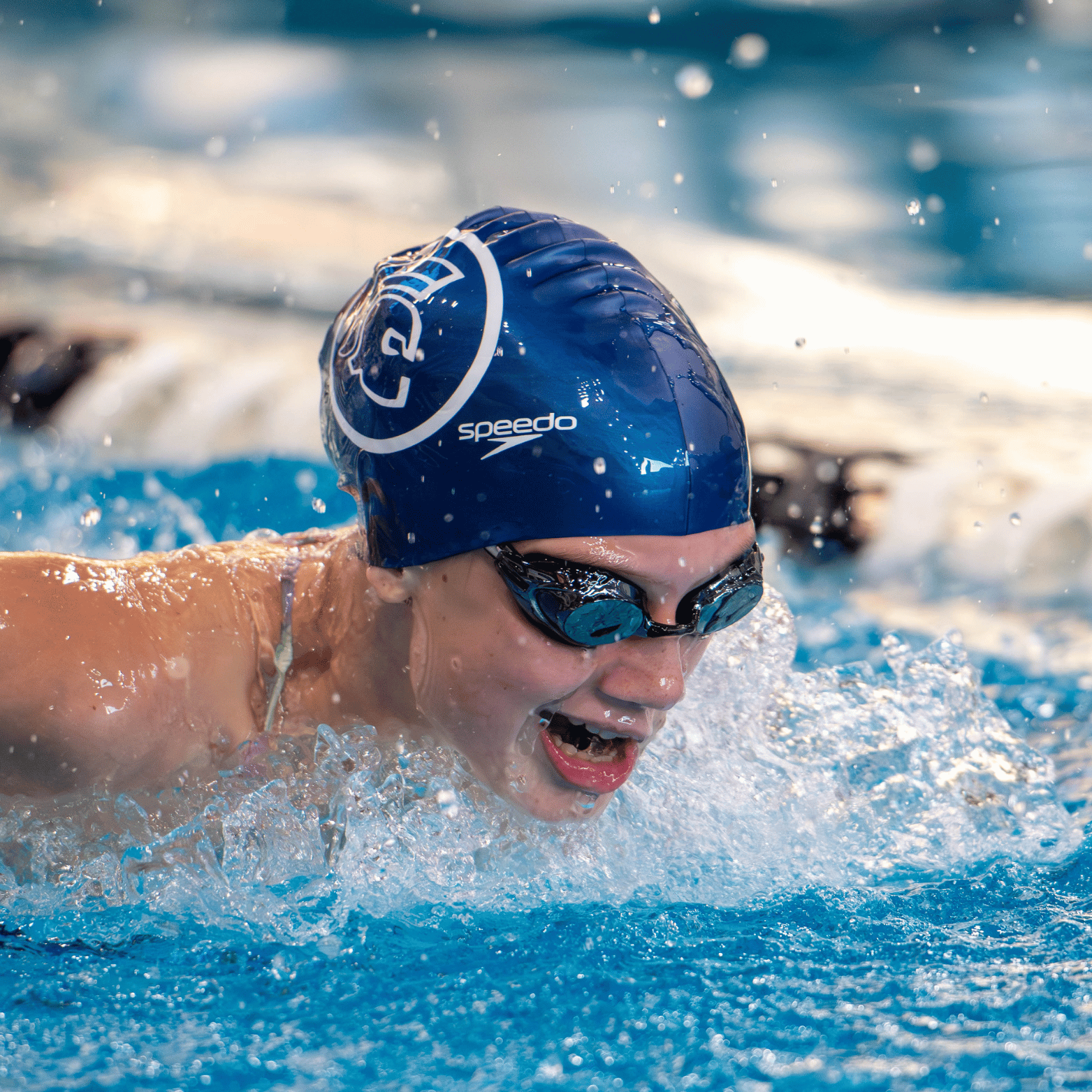 Halifax Trojan swimmer racing in the pool