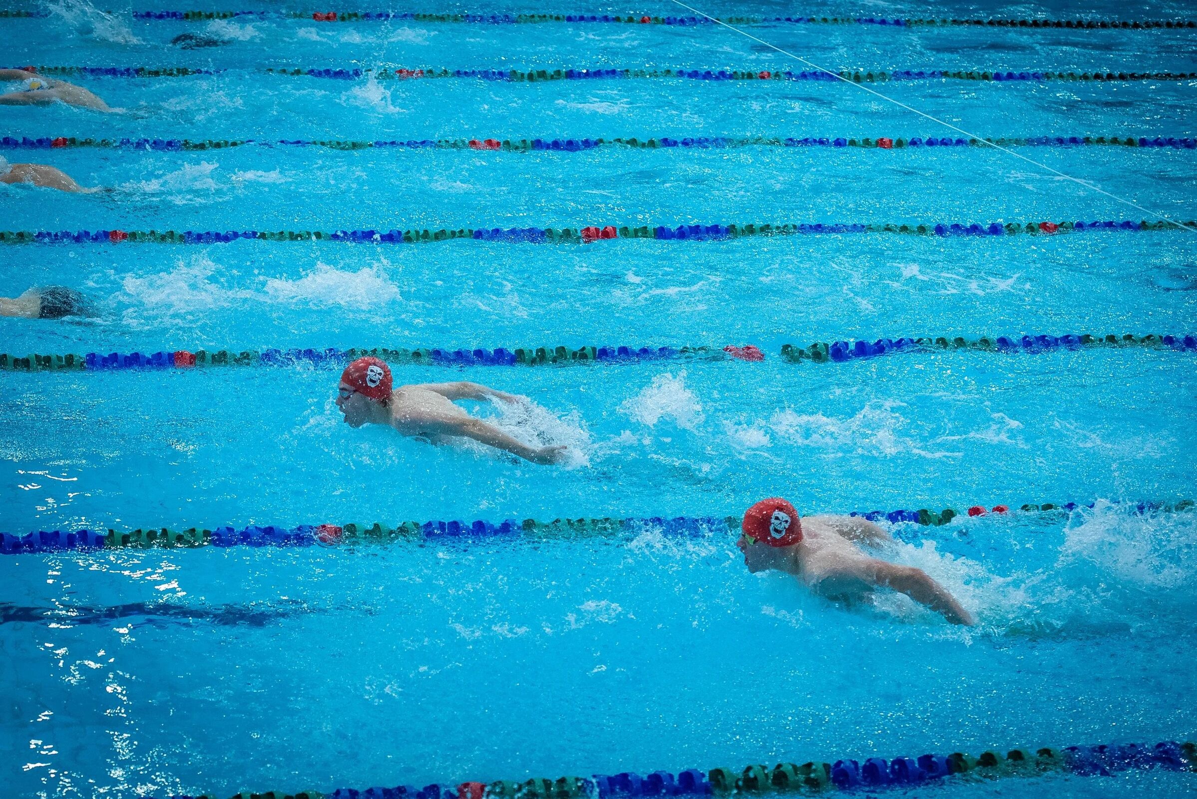 Squamish Pirates swimmers racing butterfly